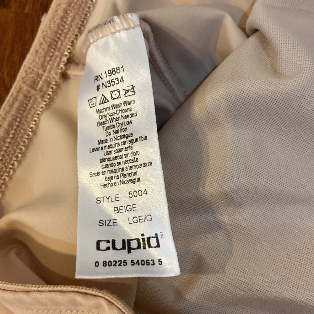 3 firm control panties never worn. 2 beige and one cream. One still has tags - Picture 6 of 6